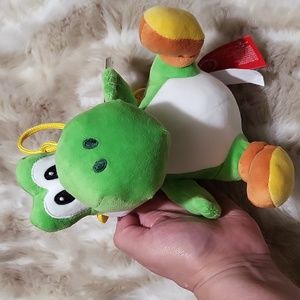 New Super Nintendo World Yoshi coin purse.